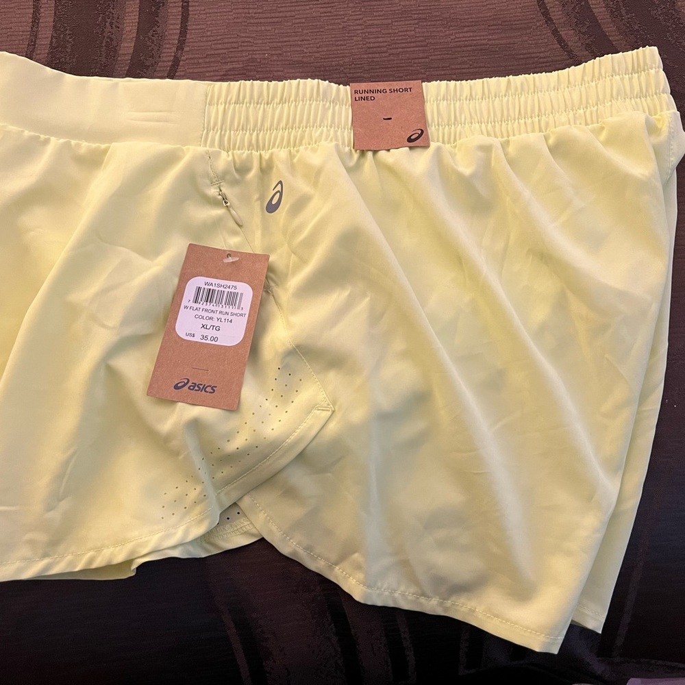 Brand ASICS new neon shorts.